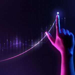 A hand lit with purple lighting raised to point to a dot on an ascending chart
