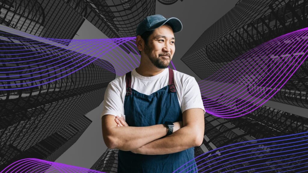 A man in a blue apron standing in front of a building background and purple swirls