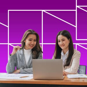Two women looking at a laptop in front of a purple geographic background.