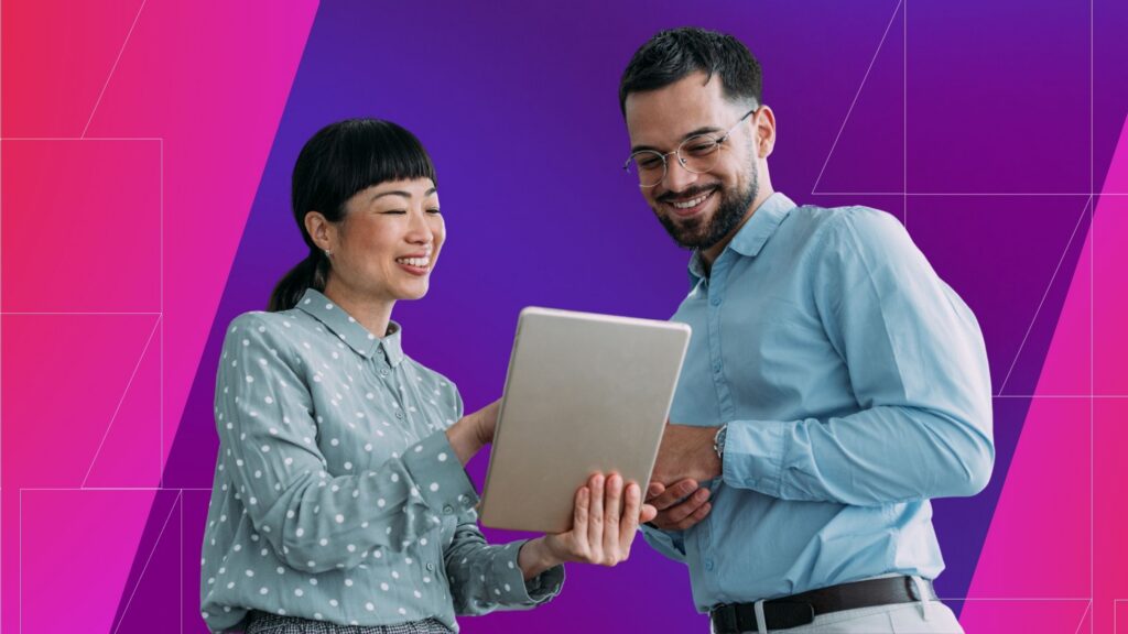 Two professionals smile while reviewing a tablet together against a pink and blue gradient background with geometric line accents, suggesting collaboration, digital strategy, and shared decision-making.