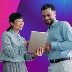 Two professionals smile while reviewing a tablet together against a pink and blue gradient background with geometric line accents, suggesting collaboration, digital strategy, and shared decision-making.